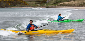 WaveSport Hydra Touring Kayak Playing In The Beach Surf