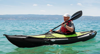 Gumotex Rush 1 One Person Inflatable Kayak With Drop Stitch Floor & Comfortable Seat Paddling On The Water