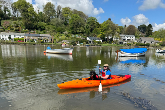 Riot Bayside 12 LV On The Water With Front Cockpit Cover Removed To Fit A Paddler And Dog Inside