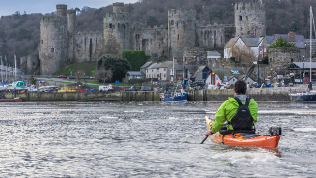 Riot Brittany 16.5 Paddling On The Water On A Large Choppy River