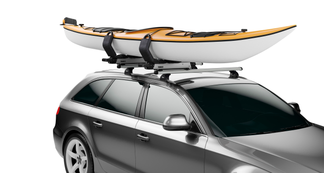 Thule Hullavator Pro 898 - Mounted To A Vehicles Roof Rack With A Kayak Securely Fastened