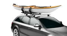 Thule Hullavator Pro 898 - Mounted To A Vehicles Roof Rack With A Kayak Securely Fastened