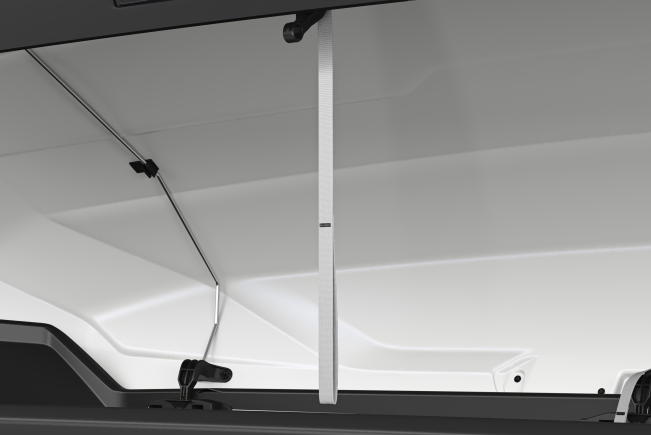 Easy to reach pull down lid strap for Thule Roof Boxes